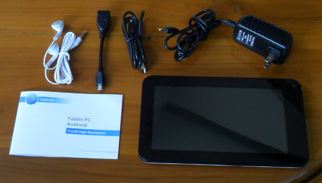 WM8850 tablet, power supply, headphone, USB cable and manual
