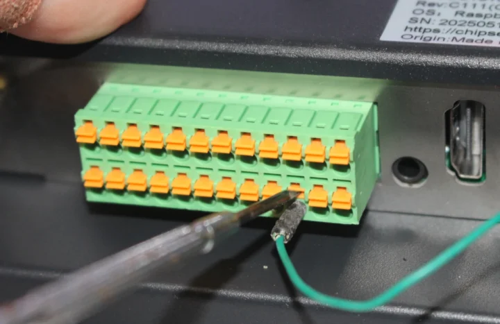 Insert wire in terminal block